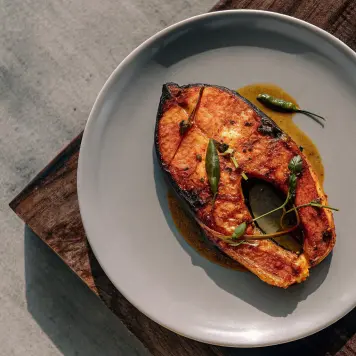 Shorshe Ilish (Hilsa with mustard)