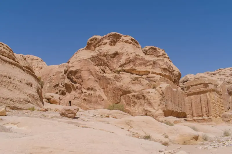 Explore ancient rock formations in Wadi Musa, Jordan's historical landscape.