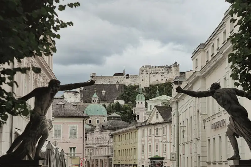 View of Salzburg's historic architecture with Hohensalzburg Fortress in the background.