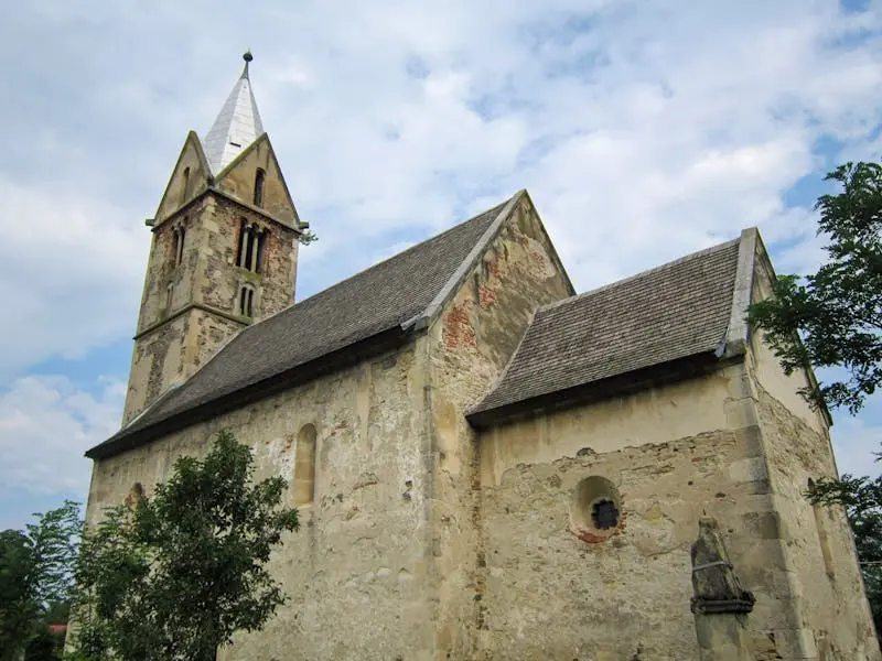 Explore the timeless beauty of a medieval church in Sântămăria-Orlea, Romania.