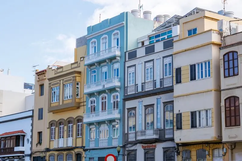 Brightly colored historic buildings in Las Palmas de Gran Canaria, Spain.